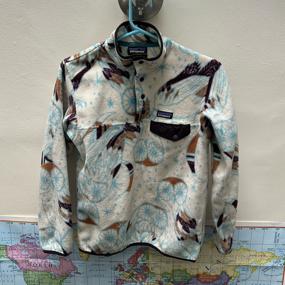 Patagonia fleece top. Women’s size small. Off white with beautiful accents.